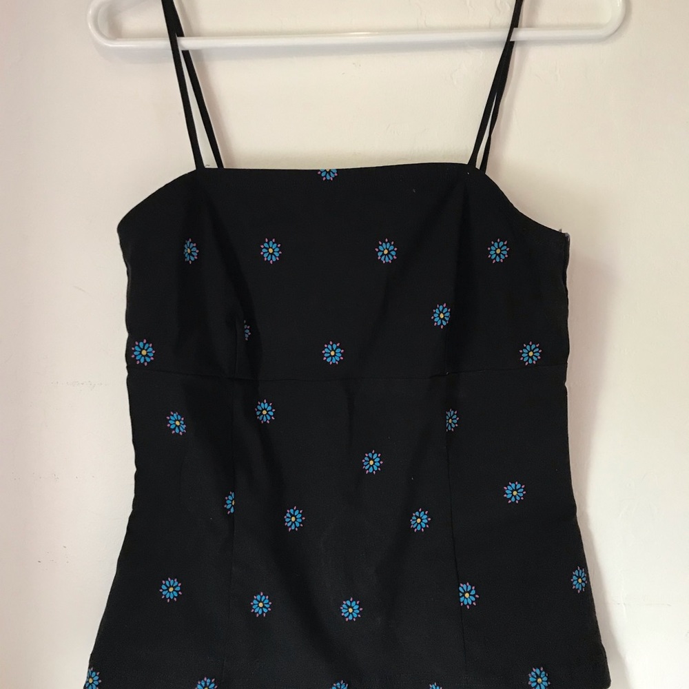 Black top with floral detailing